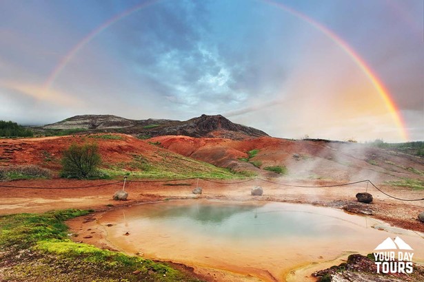 rainbow over a geothermal formation 
