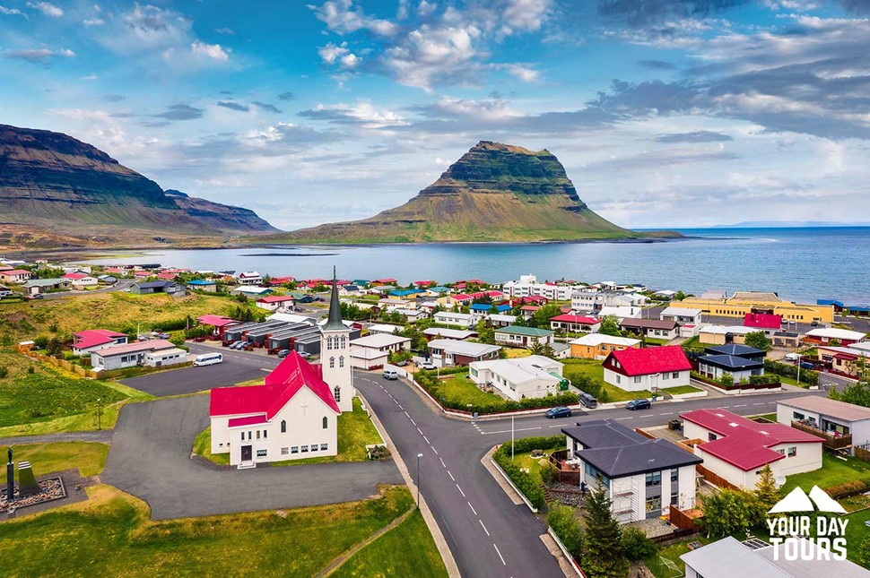 a view of a town of grundarfjörður in iceland