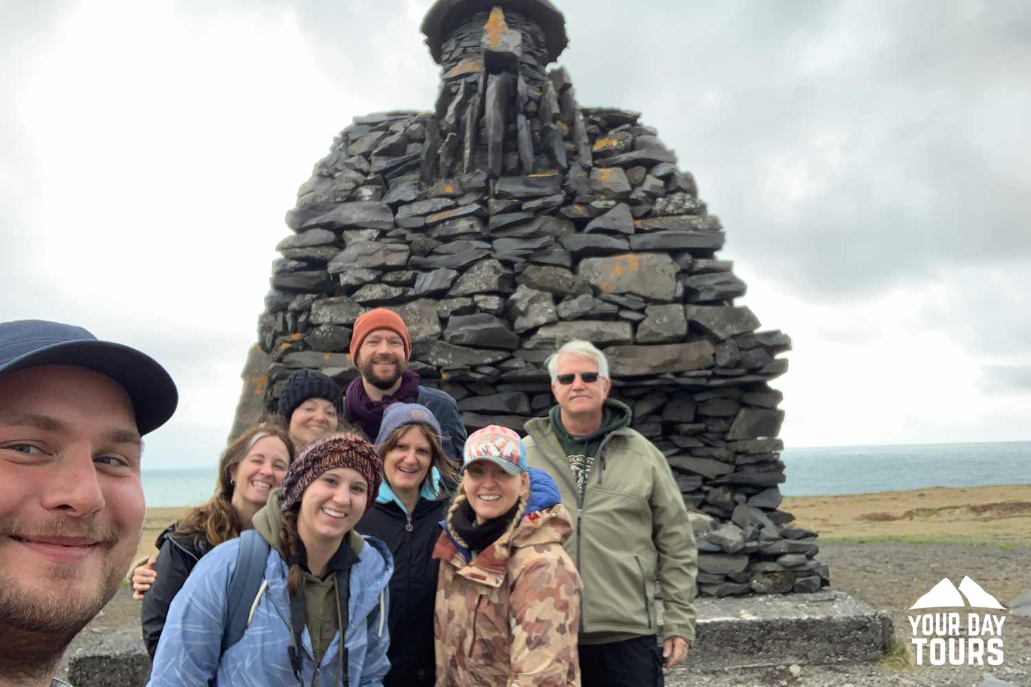 guide taking a selfie with happy customers in iceland