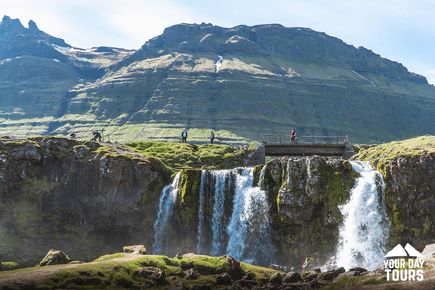kirkjufellfoss waterfall near mountain