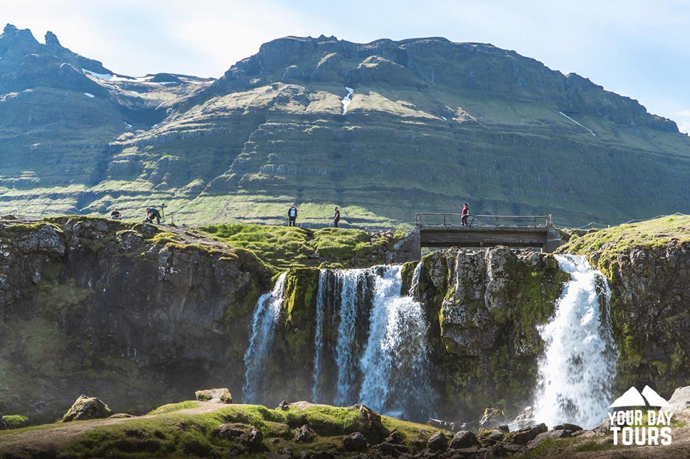kirkjufellfoss waterfall near mountain