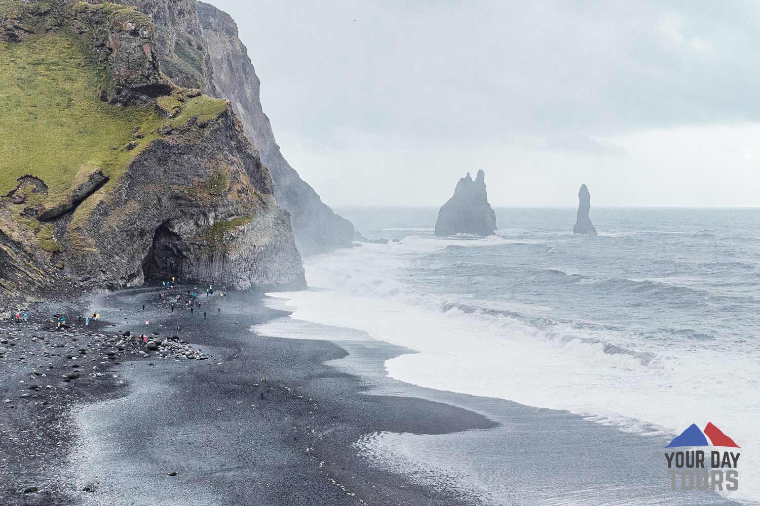aerial view of black sand beach 
