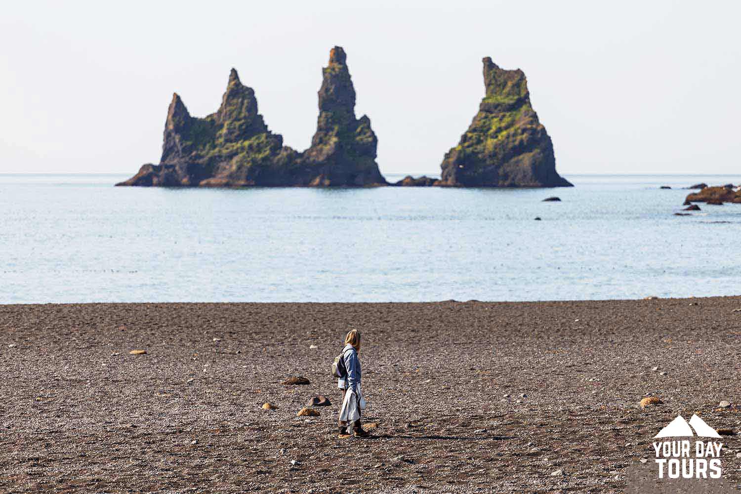 woman hiking in reynisfjara