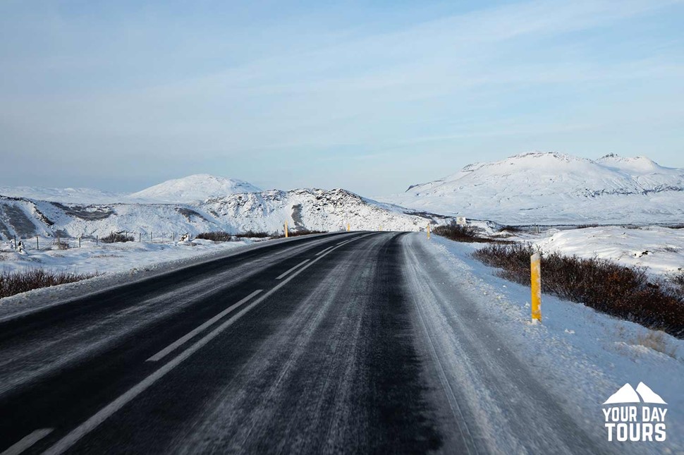 snowy winter road in iceland