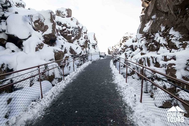 view of a walking path in winter in thingvellir