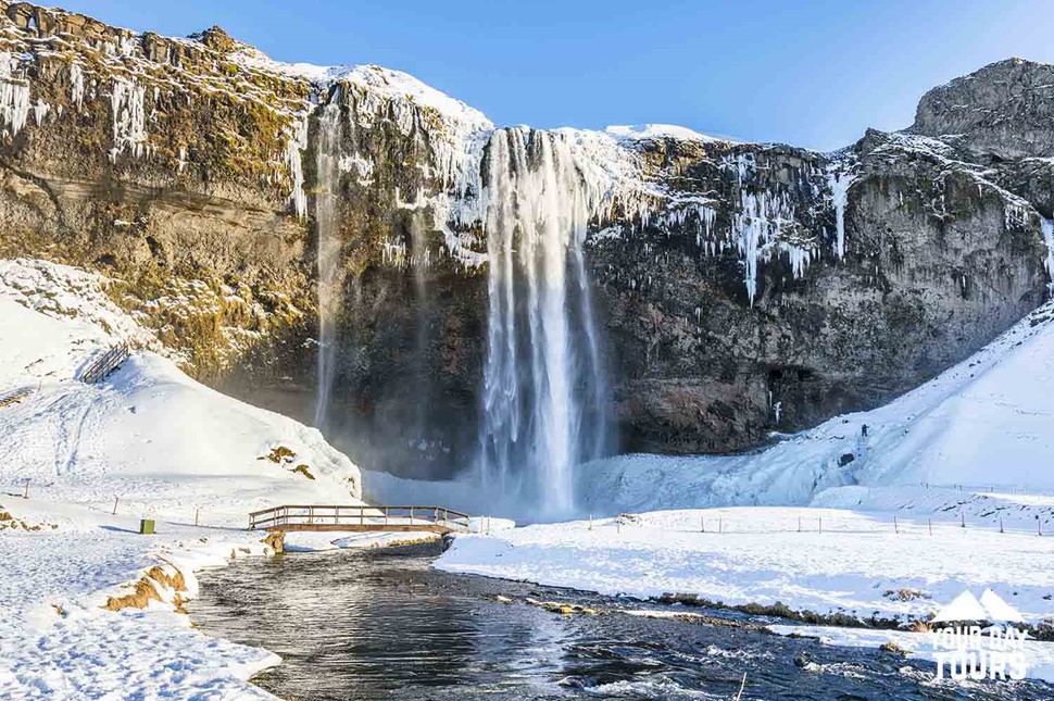 snowy seljalandsfoss waterfall in iceland