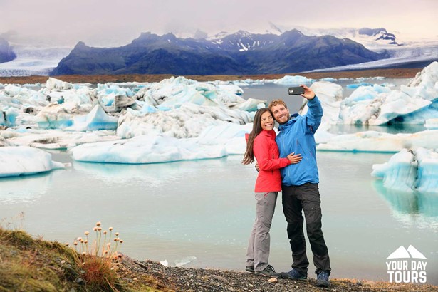 two people taking a picture in iceland