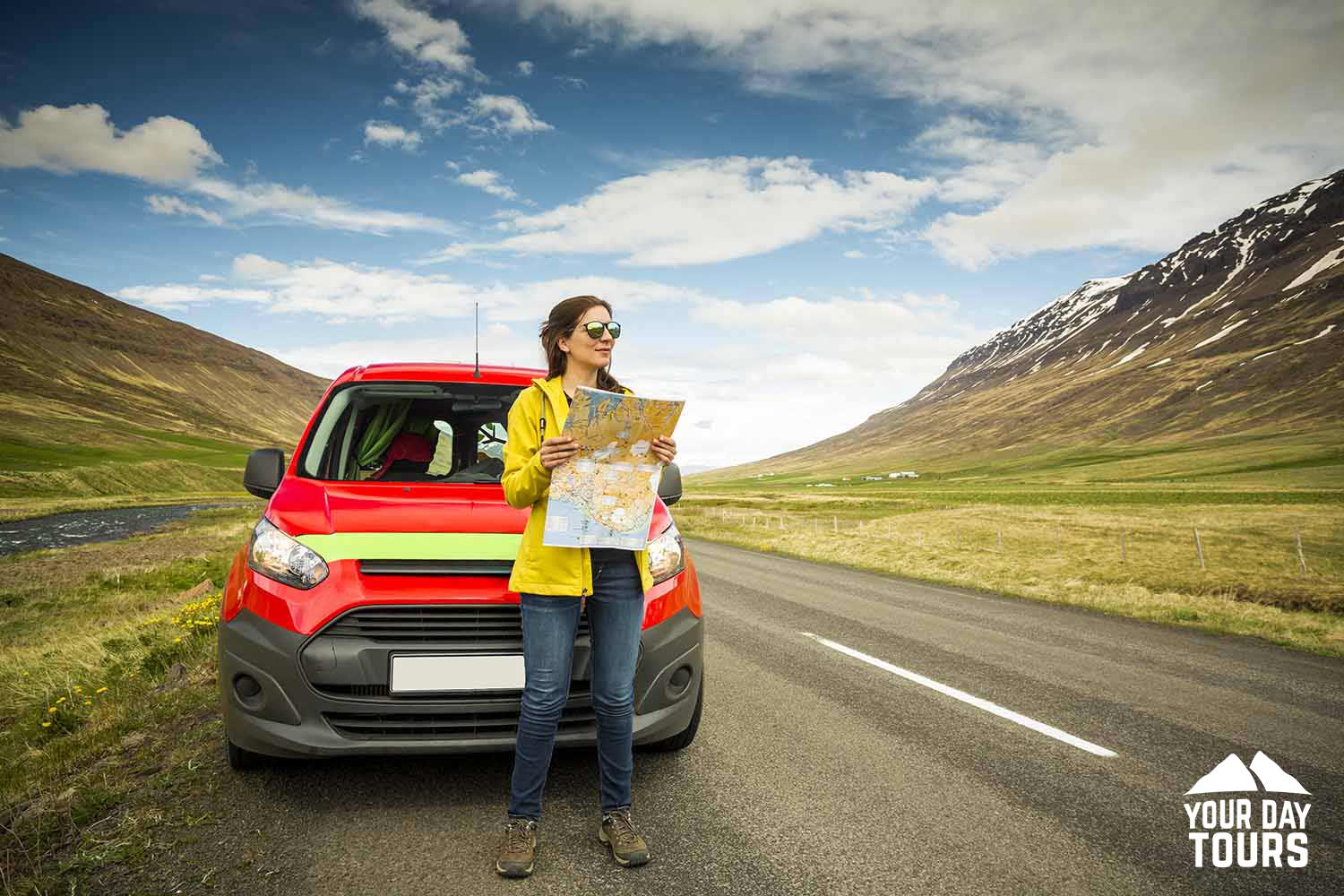 woman holding a map to gullfoss