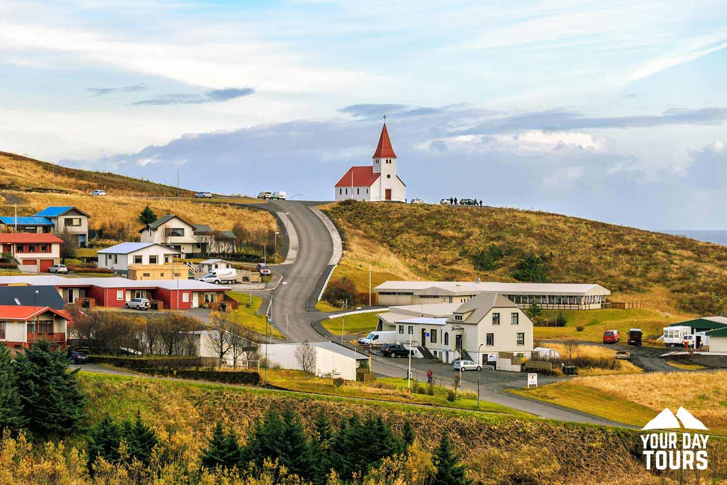 a view of vikurkirkja from far away