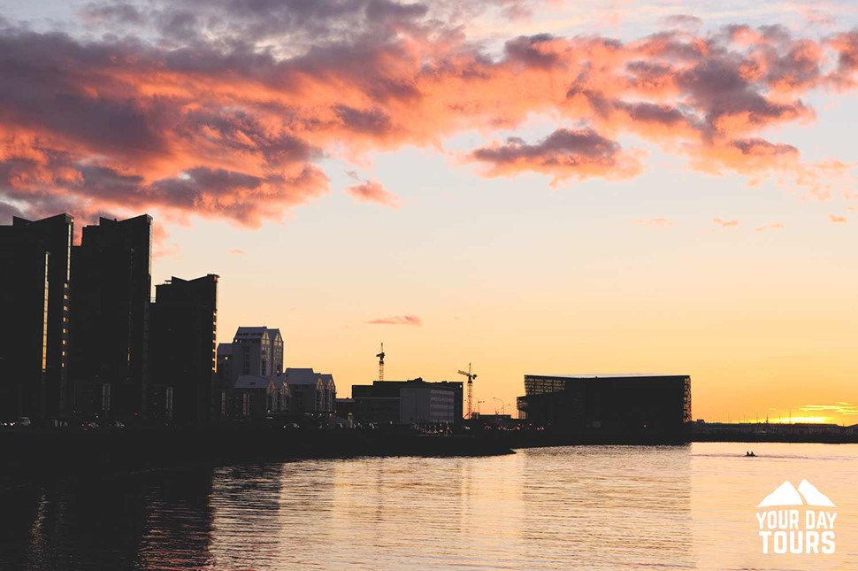 sun setting down in reykjavik city 